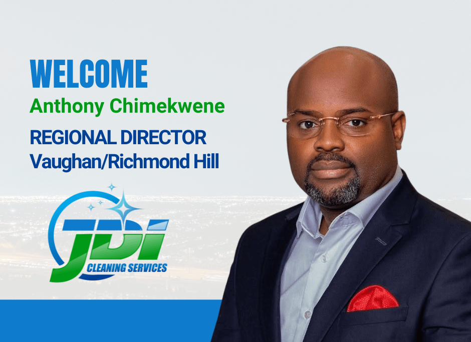 Portrait of Anthony Chimekwene, Regional Director for JDI Cleaning Services in Vaughan/Richmond Hill, welcoming clients with a professional demeanor and a stylish outfit.